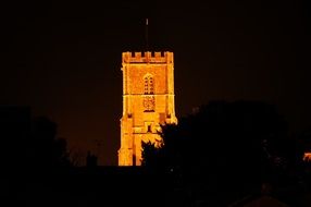 yellow tower in the dark