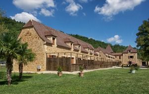 guest cottages next to the lawn in france