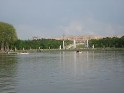 castle near the water in versailles