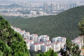 cityscape with mountains, china, xuzhou