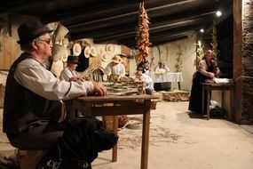 folk group in an old country house