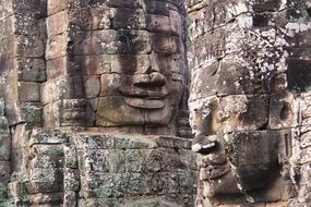 stone faces on the walls of Bayon temple