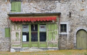 facade old building of the abandoned cafe