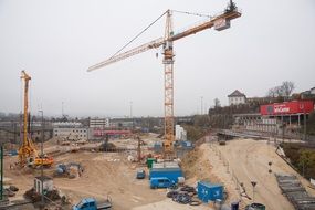 yellow crane and construction equipment at a site in Stuttgart