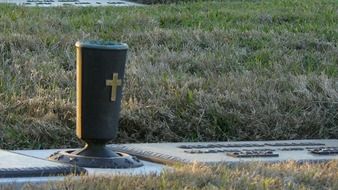 cemetery vase at grave