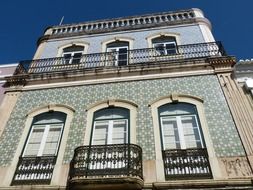 beautiful ceramic tile on facade of old house, portugal, algarve, silves