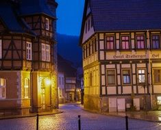 half-timbered houses at night