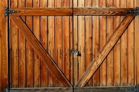 Wooden door on a farm with lock