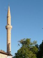 minaret on the sky background