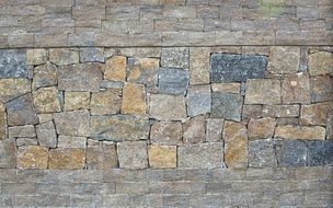 Colorful stone block wall, background