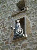 statue in a window in the city of blankenberg