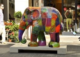 multi-colored elephant statue in the shopping city center