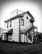 black and white picture of an old rural house