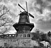 black and white photo of an old mill in Berlin