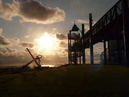 anchor monument on the sunset