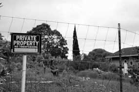 private property, fence, black and white