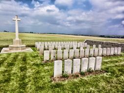 cemetery landscape with cross and monuments, france