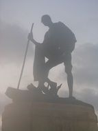 man statue in fog in india