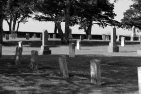 stone gravestones in a cemetery in the historic fort of Reno