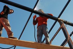 Workers on a construction, welding, iraq