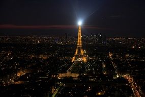 distant view of the eiffel tower in night city, france, paris