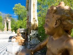 sculpture of an angel near the palace