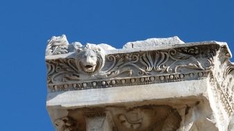 lion head on roman column