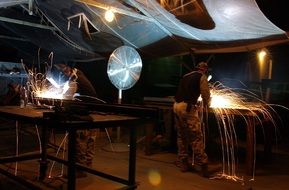 Construction workers welding