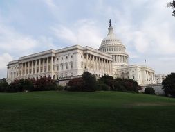 government building on a green hill in washington