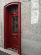 red front door of a bourgeois style