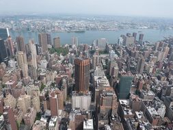 view of skyscrapers near the river in new york
