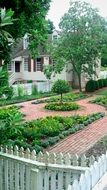 garden in front of the house in colonial style