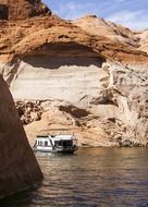 boat on lake Powell among the rocks