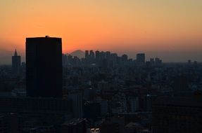 sunset over the city in tokyo