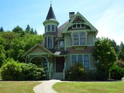 house among green trees