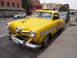 Picture of yellow retro taxi