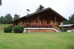 wooden house near the mountains