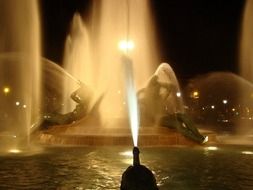 Sculptures with a fountain in the city at night, philadelphia