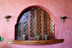 moroccan design arch with wooden fence