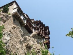 hanging houses on a rock in spain