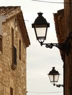 street lights on the stone building