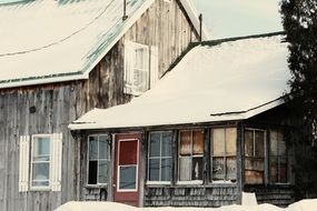 wooden house in winter