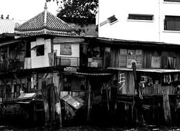 old houses by the river in bangkok