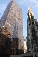 cathedral near a skyscraper in manhattan