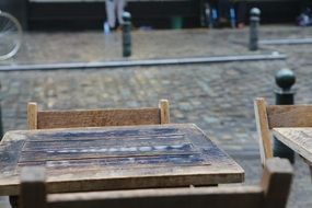 table with chairs in a street cafe