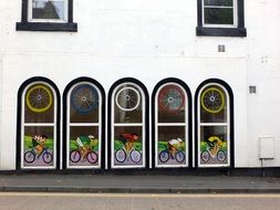 Cyclists on a windows