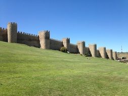 avila walls and grass