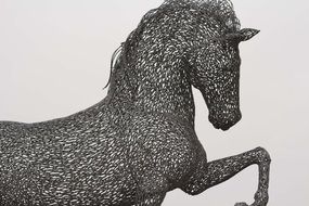black and white horse statue