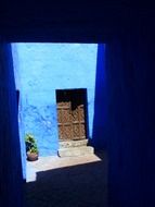 view of the front door through the window