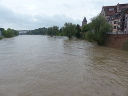 landscape of rainy weather and high water of danube ulm